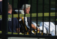 <p>U.S. Rep. Roger Williams is wheeled away by emergency medical service personnel from the Eugene Simpson Stadium Park June 14, 2017 in Alexandria, Va. (Photo: Alex Wong/Getty Images) </p>