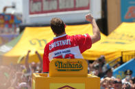 <p>Joey Chestnut is carried to the stage before competing in and winning Nathan’s Famous Fourth of July International Hot Dog-Eating Contest at Coney Island in Brooklyn, New York City, U.S., July 4, 2017. (Andrew Kelly/Reuters) </p>