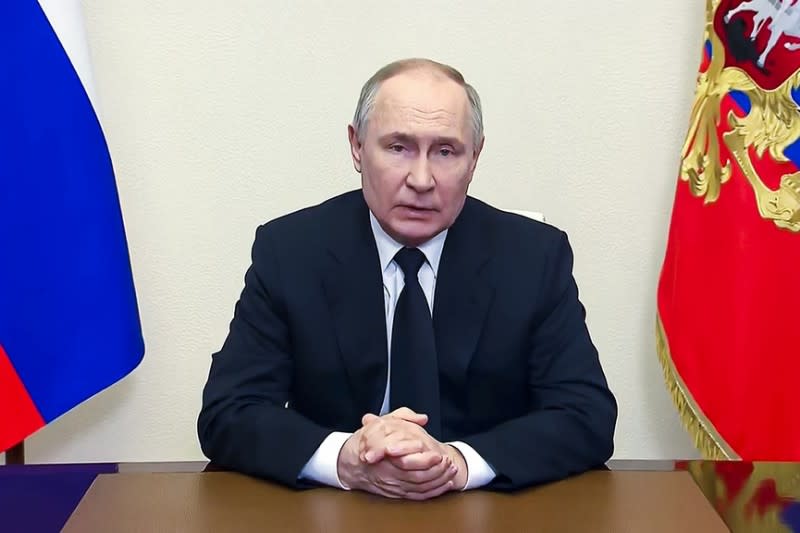 <cite>2024年3月23日，莫斯科音樂廳恐攻事件過後19小時，俄羅斯總統普京透過電視轉播向全國發表講話。（AP）</cite>