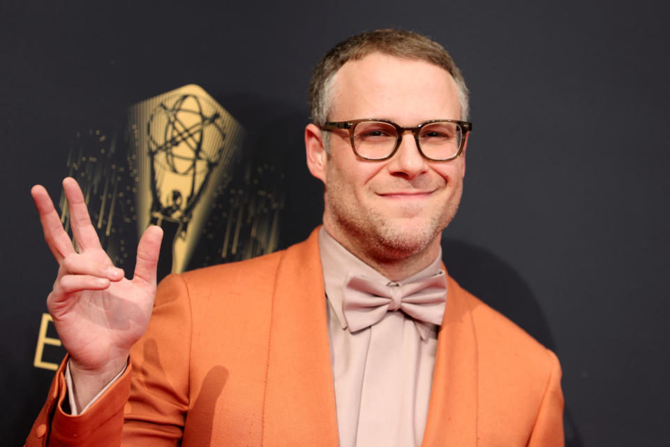 seth rogen waving at the Emmy Awards