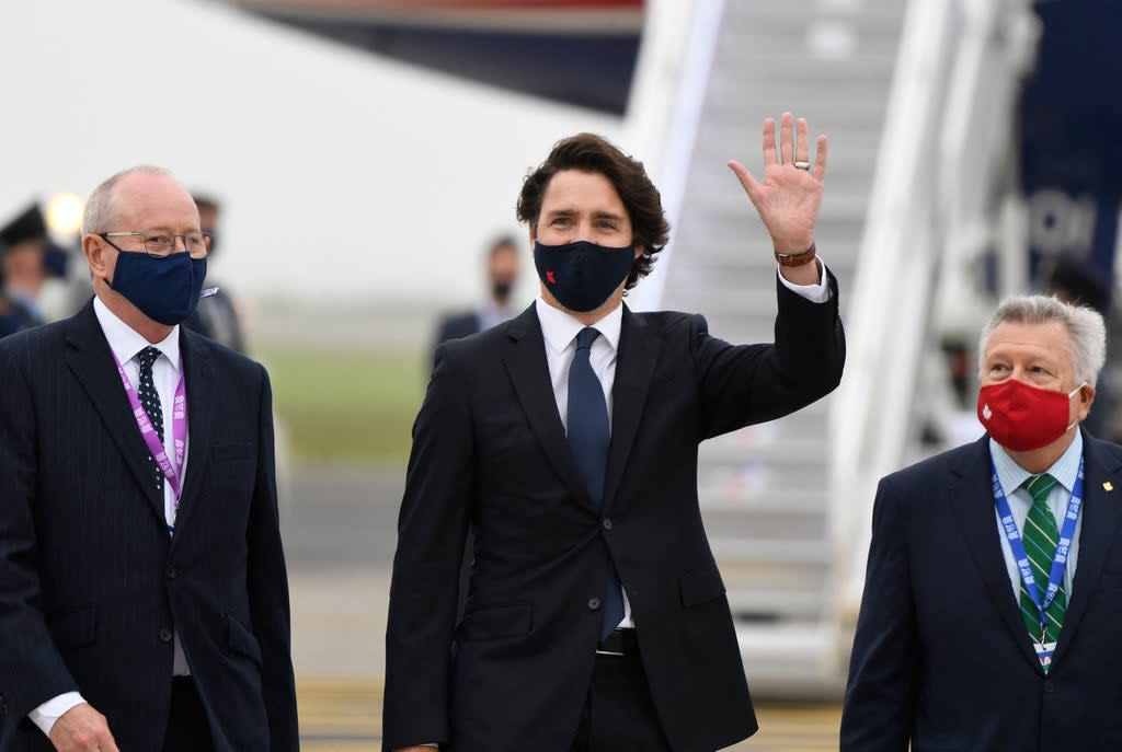 Canada’s prime minister Justin Trudeau in a mask arriving in the UK for the G7 summit in June (AFP via Getty Images)