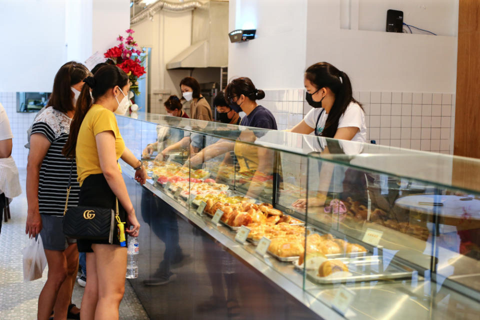 Customers at Fung Wong's new store. — Picture by Ahmad Zamzahuri