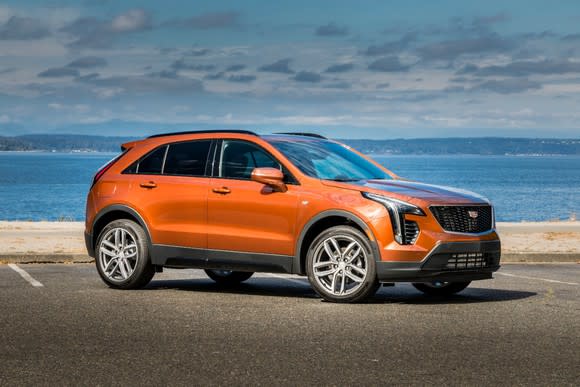 An orange Cadillac XT4 crossover