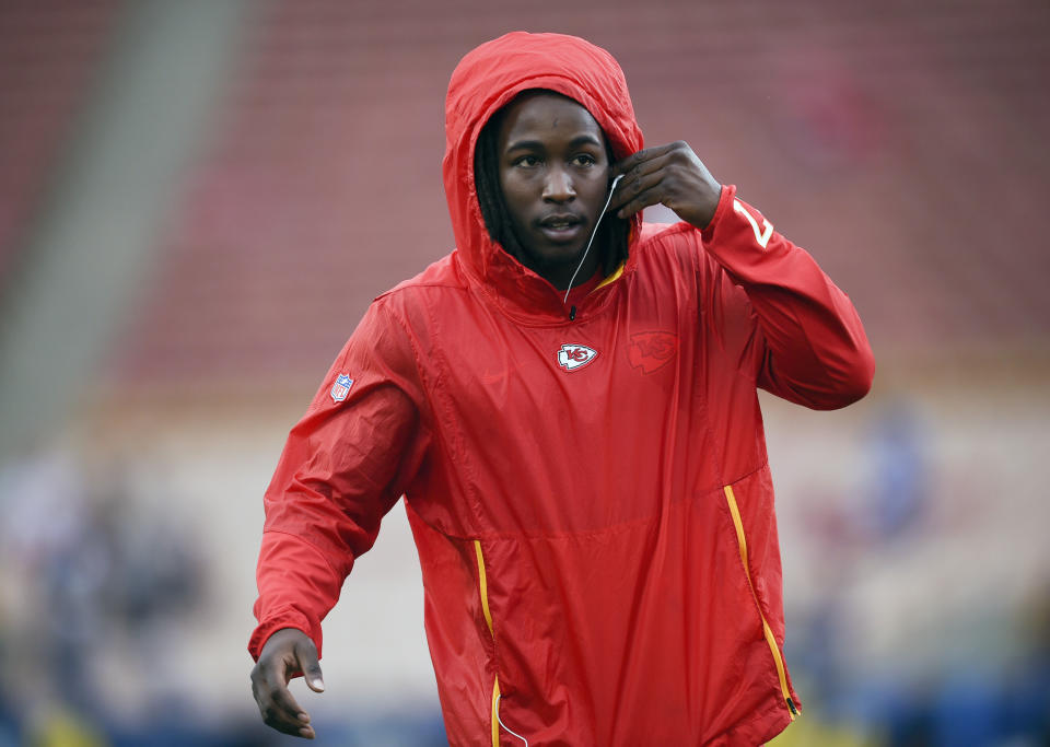 FILE - In this Nov. 19, 2018, file photo, Kansas City Chiefs running back Kareem Hunt warms up before an NFL football game against the Los Angeles Rams, in Los Angeles. The NFL has suspended Browns running back Kareem Hunt for eight games after a video showed him kicking a woman and he was later involved in a fight at a resort. The league on Friday, March 15, 2019, cited a violation of its personal conduct policy "for physical altercations at his residence in Cleveland last February and at a resort in Ohio last June." Hunt will not be paid during the half-season suspension, which he will not appeal. (AP Photo/Kelvin Kuo, File)