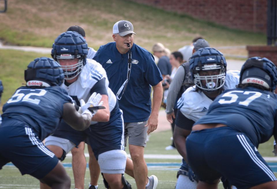 Georgia Southern's new head football coach Clay Helton (with whistle) leads the first practice of the fall on Wednesday, Aug. 3, 2022 at Paulson Stadium in Statesboro.