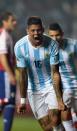 Argentina's Marcos Rojo celebrates after scoring a goal against Paraguay during their Copa America semi-final match in Concepcion, Chile, on June 30, 2015