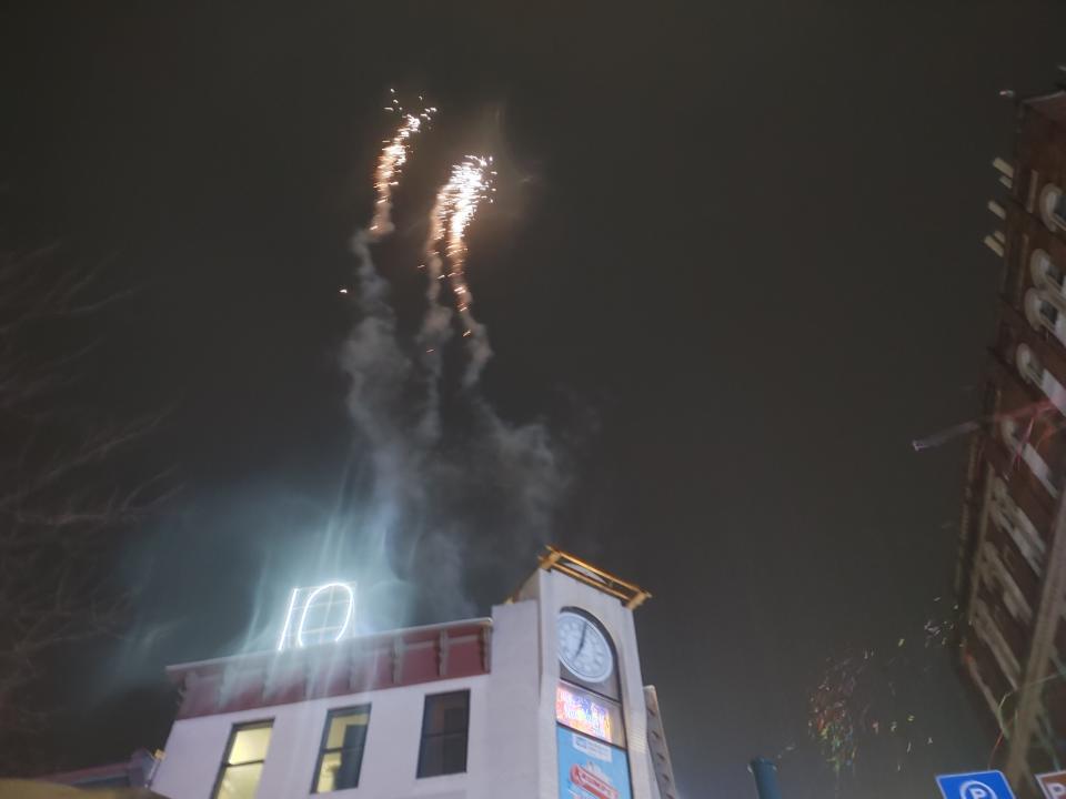 Fireworks shoot into the air from the top of the Clocktower Building after the Middletown Valley Bank Krumpe's Donut Drop  in downtown Hagerstown on Dec. 31, 2022. The family-friendly New Year's Eve event rang in 2023 at 7 p.m.