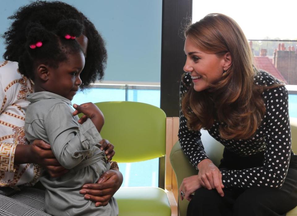 The Duchess of Cambridge chatted to young mothers and their children at a visit to the Sunshine House Children and Young People's Health and Development Centre [Photo: Getty]