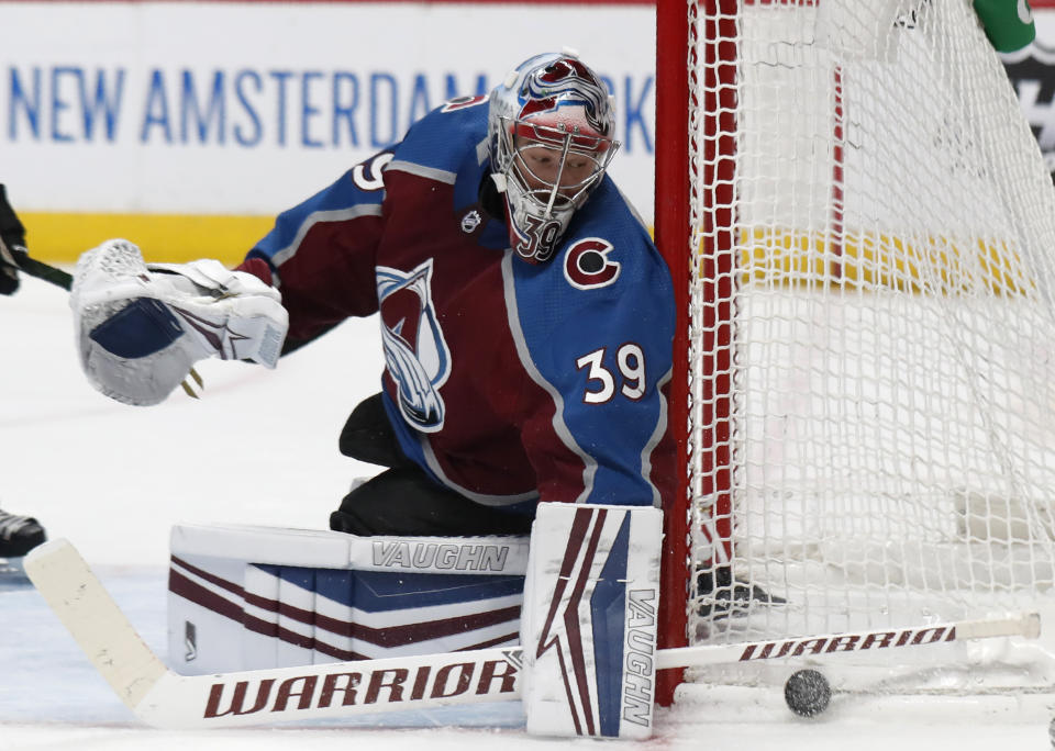 Colorado Avalanche goaltender Pavel Francouz turns away a shot from the New York Islanders during the second period of an NHL hockey game Wednesday, Feb. 19, 2020, in Denver. (AP Photo/David Zalubowski)