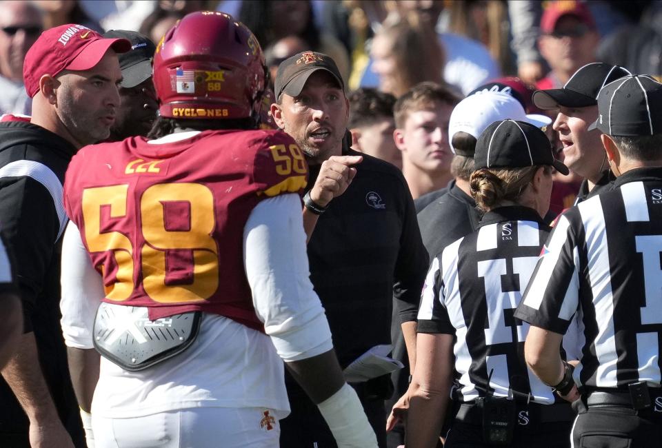 Iowa State football coach Matt Campbell argues a call with officials in the first quarter of Saturday's game against Oklahoma.