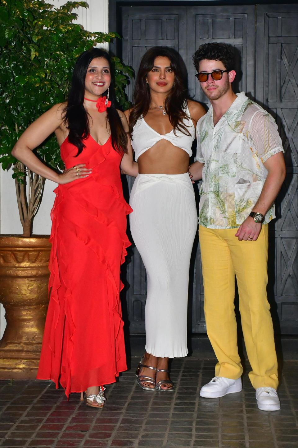 Priyanka Chopra with husband Nick and cousin, Mannara Chopra in Mumbai.