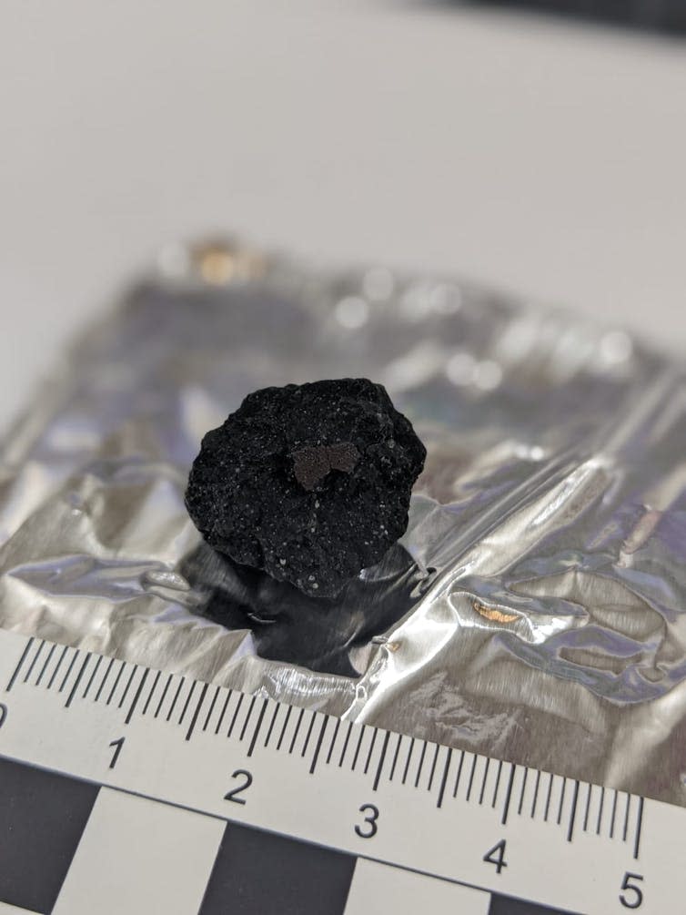 Image of a meteorite piece weighing about 4g.
