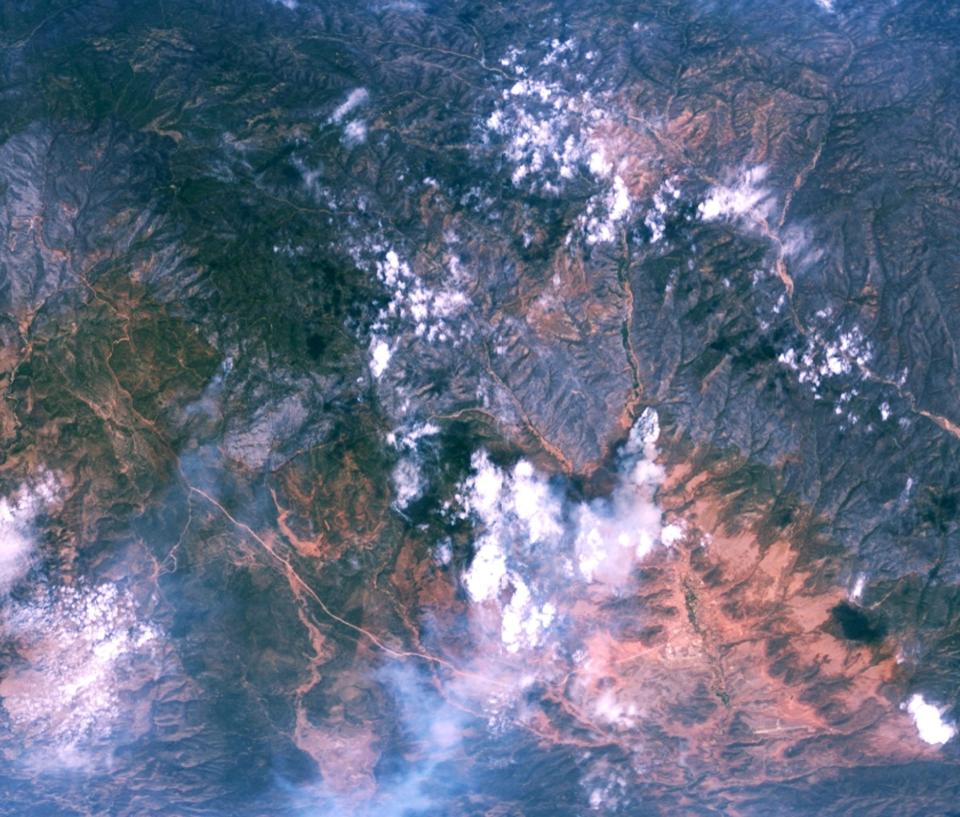 A natural color image of Arizona's Rodeo-Chediski wildfire is shown from NASA's MODIS Airborne Simulator flying aboard the space agency's ER-2 aircraft July 1, 2002.