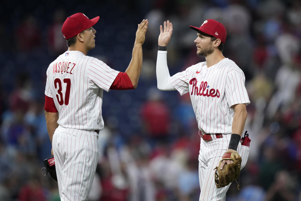 Philadelphia Phillies' Trea Turner, right, and Andrew Vasquez celebrate after a baseball game against the Detroit Tigers, Monday, June 5, 2023, in Philadelphia. (AP Photo/Matt Slocum)