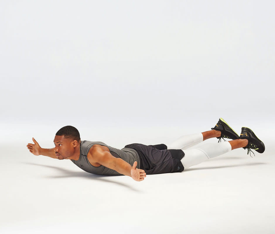 How to Do It<ol><li>Lie on stomach, limbs outstretched, to start.</li><li>Engage core, glutes, and back to lift torso off floor. </li><li>Press arms up into a Y shape and hold for 20 seconds.</li><li>Bend elbows and bring toward rib cage to make a W and hold for 20 seconds.</li><li>Reach arms out to sides to form a T and hold for 20 seconds. </li><li>That's 1 set.</li></ol>