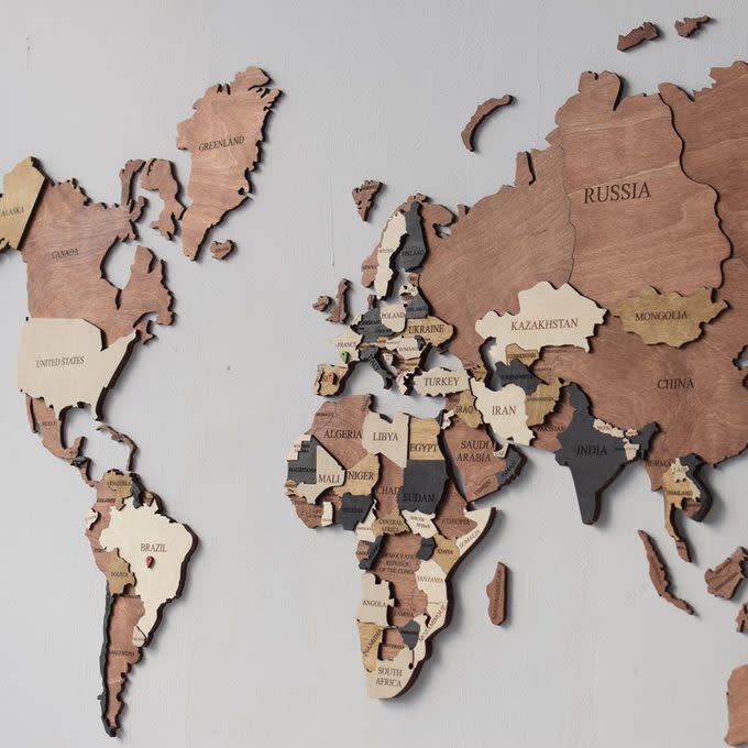 <a href="https://fave.co/35t1hIT" rel="noopener" target="_blank" data-ylk="slk:3D World Map Wood Map Wall Art;elm:context_link;itc:0;sec:content-canvas" class="link rapid-noclick-resp">3D World Map Wood Map Wall Art</a>