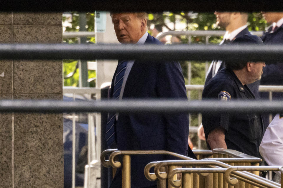 Former President Donald Trump arrives at Manhattan criminal court, Tuesday, April 16, 2024, in New York. Trump is set to return to court as a judge works to find a panel of jurors who'll decide whether the former president is guilty of criminal charges alleging he falsified business records to cover up a sex scandal during the 2016 campaign. (AP Photo/Yuki Iwamura)