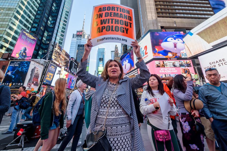 TIMES SQUARE, NEW YORK, UNITED STATES - 2019/06/04: Protesters demanding 'Abortion Without Apology' gathered at at Times Square Red Step as part of a national day of action to stop the abortion bans. Participants wore bloody pants and shouted, Abortion is on the verge of being illegal!. (Photo by Erik McGregor/Pacific Press/LightRocket via Getty Images)