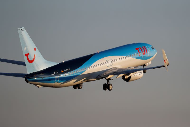 FILE PHOTO: A TUI fly Boeing 737 airplane takes off from the airport in Palma de Mallorca