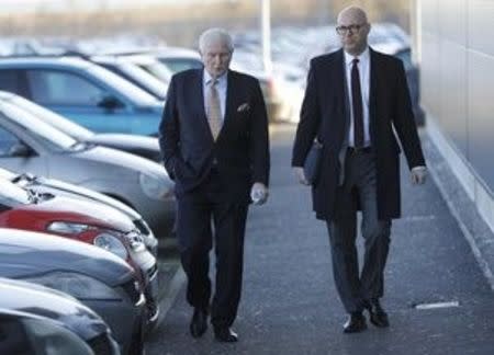 Sports Direct Chairman Keith Hellawell (L) arrives for a general meeting to vote on his re-appointment in Shirebrook, January 5, 2017. REUTERS/Darren Staples