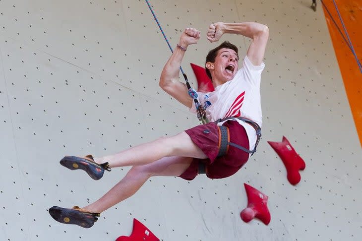 "John Brosler celebrates his bronze medal in speed climbing at the World Youth Championship in British Columbia"