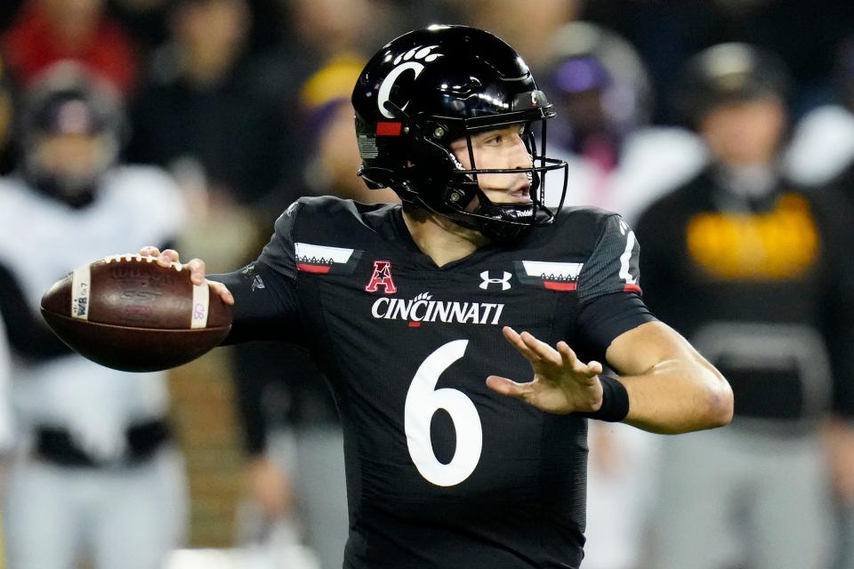 Cincinnati Bearcats quarterback Ben Bryant (6) throws a pass in the second quarter of the NCAA American Athletic Conference game between the Cincinnati Bearcats and the East Carolina Pirates at Nippert Stadium in Cincinnati on Friday, Nov. 11, 2022.