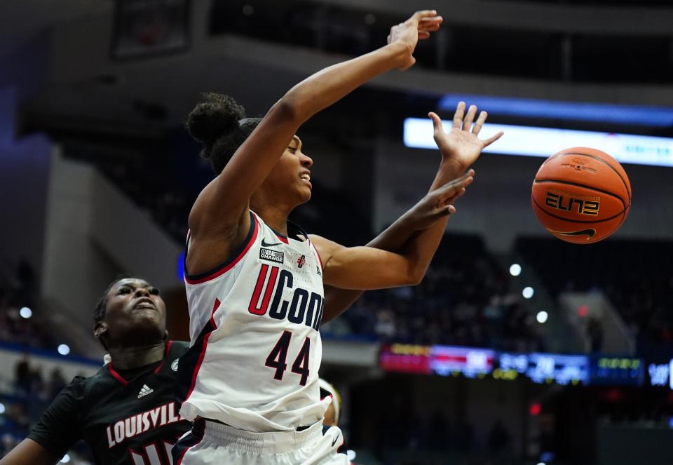 Louisville forward Olivia Cochran fouls UConn guard Aubrey Griffin in the second half. Cochran scored 12 points. Griffin scored a game-high 25 points Saturday.
