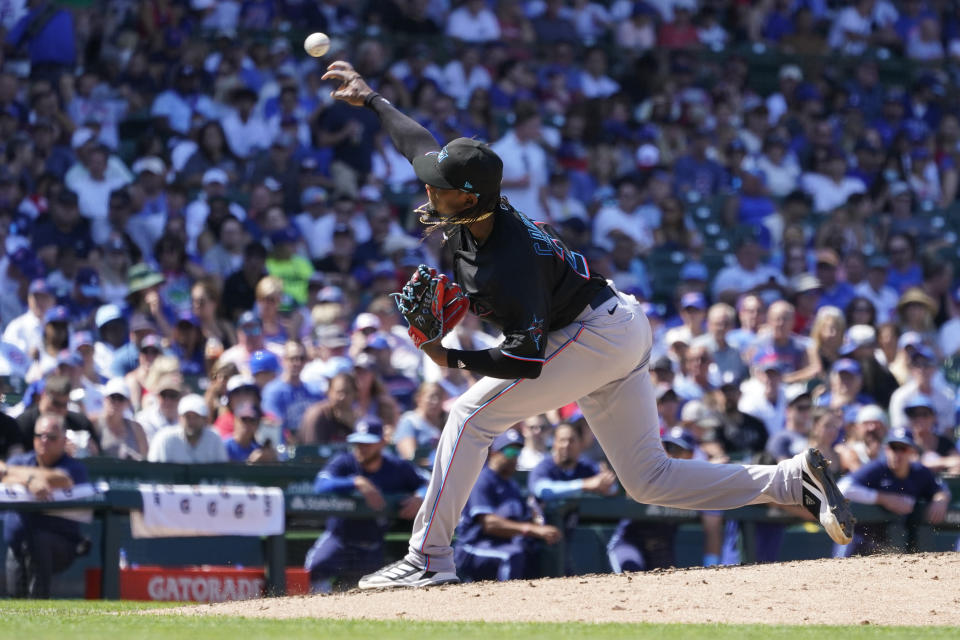 Miami Marlins starting pitcher Edward Cabrera delivers during the fourth inning of a baseball game against the Chicago Cubs Friday, Aug. 5, 2022, in Chicago. (AP Photo/Charles Rex Arbogast)