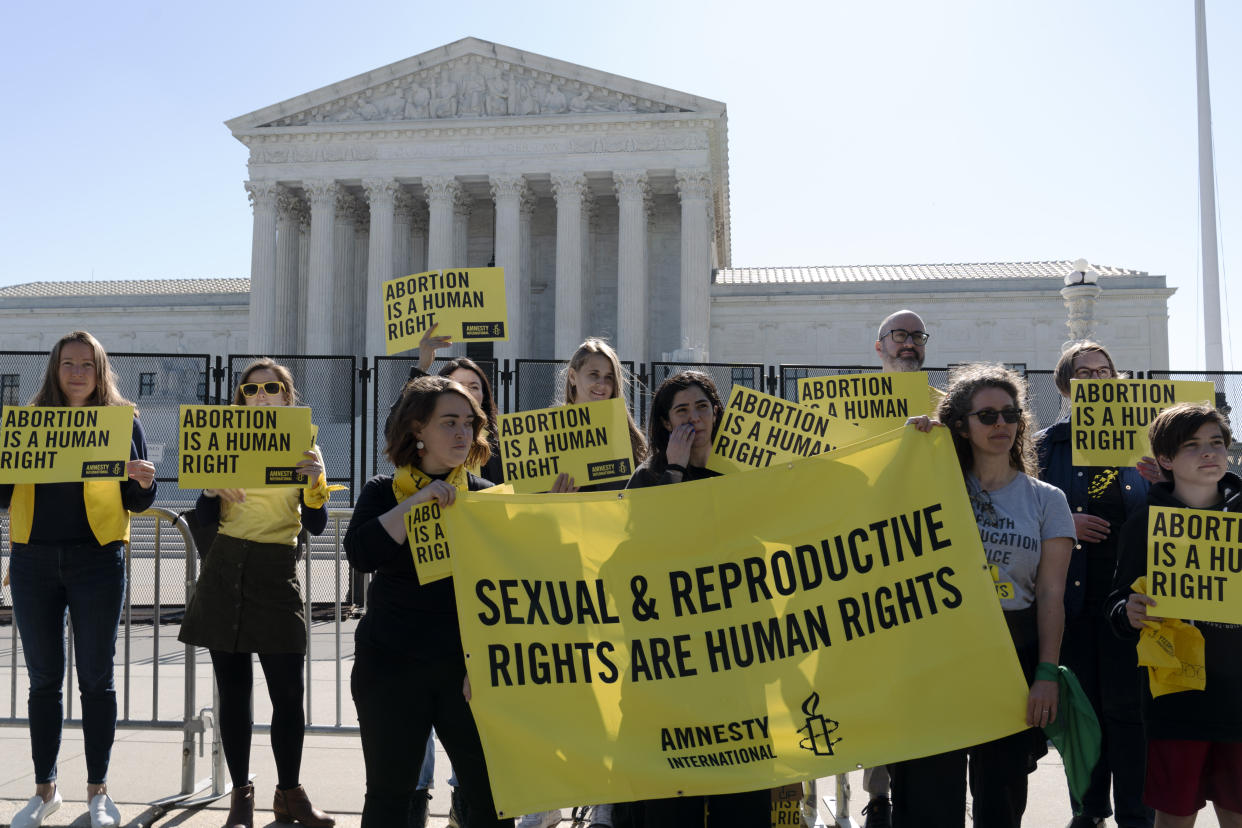 Abortion rights activists protest outside of the U.S. Supreme Court, Wednesday, May 11, 2022 in Washington. A draft opinion suggests the U.S. Supreme Court could be poised to overturn the landmark 1973 Roe v. Wade case that legalized abortion nationwide, according to a Politico report. (AP Photo/Jose Luis Magana)