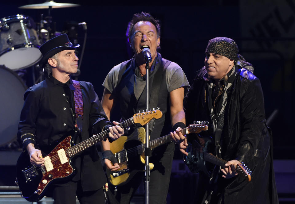 FILE - In this March 15, 2016 file photo, Bruce Springsteen, center, performs with Nils Lofgren, left, and Steven Van Zandt of the E Street Band during their concert at the Los Angeles Sports Arena in Los Angeles. Springsteen's latest album, "Letter To You" will be released on Oct. 23. (Photo by Chris Pizzello/Invision/AP, File)