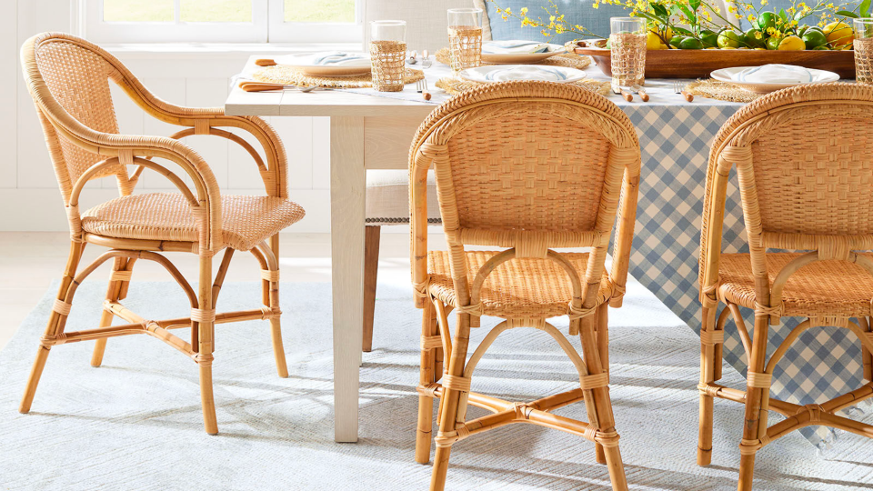 These rattan chairs conjure seaside memories.