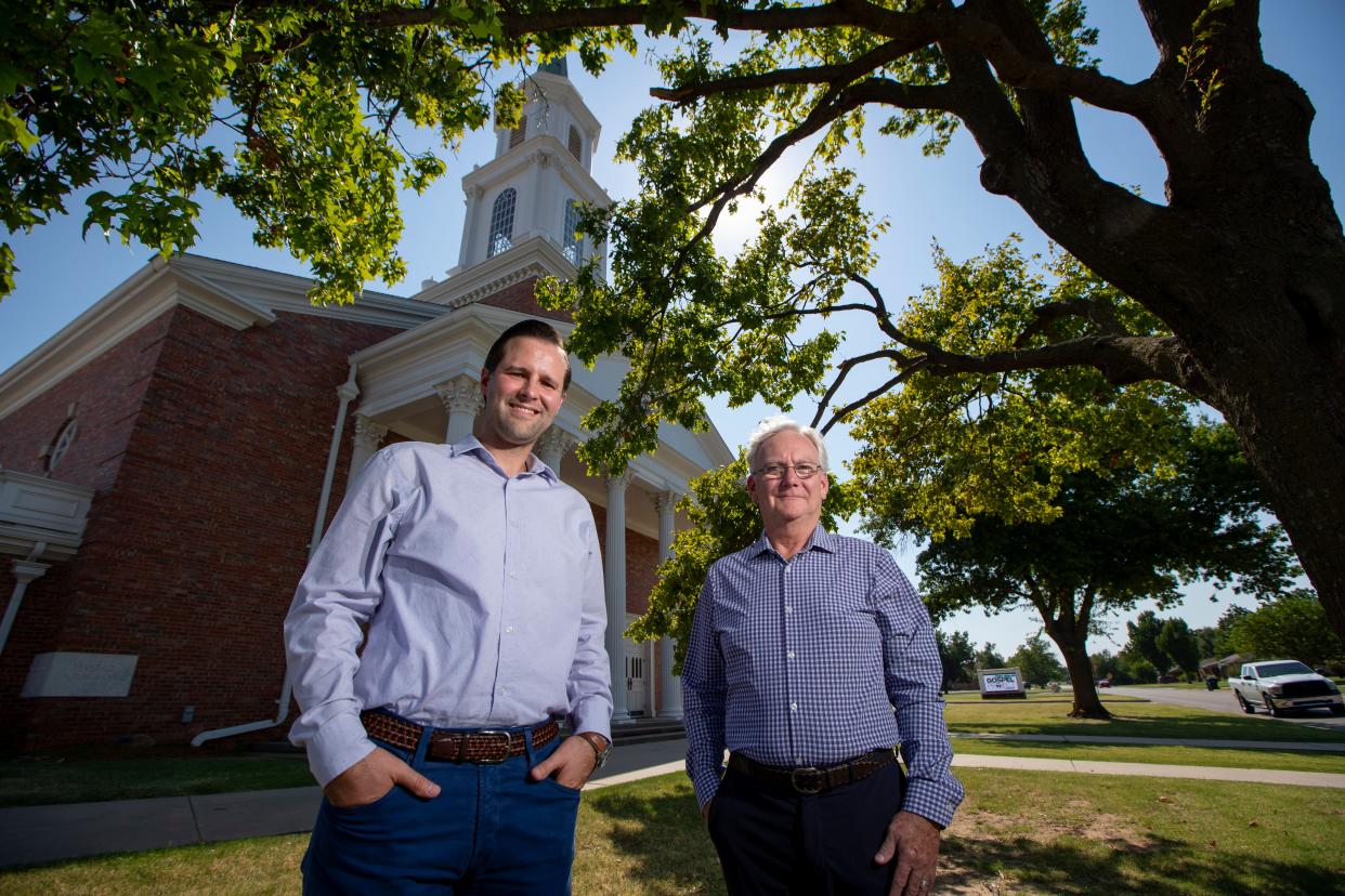 Jared Chambers, Mayfair Church of Christ preaching minister, left, and Marty Grubbs, senior pastor of Crossings Community Church, stand outside Mayfair Church of Christ, 2340 NW 50, which will soon become a Crossings satellite.