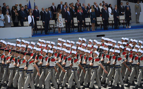 Donald Trump was in awe of France's Bastille Day military parade - Credit:  AFP