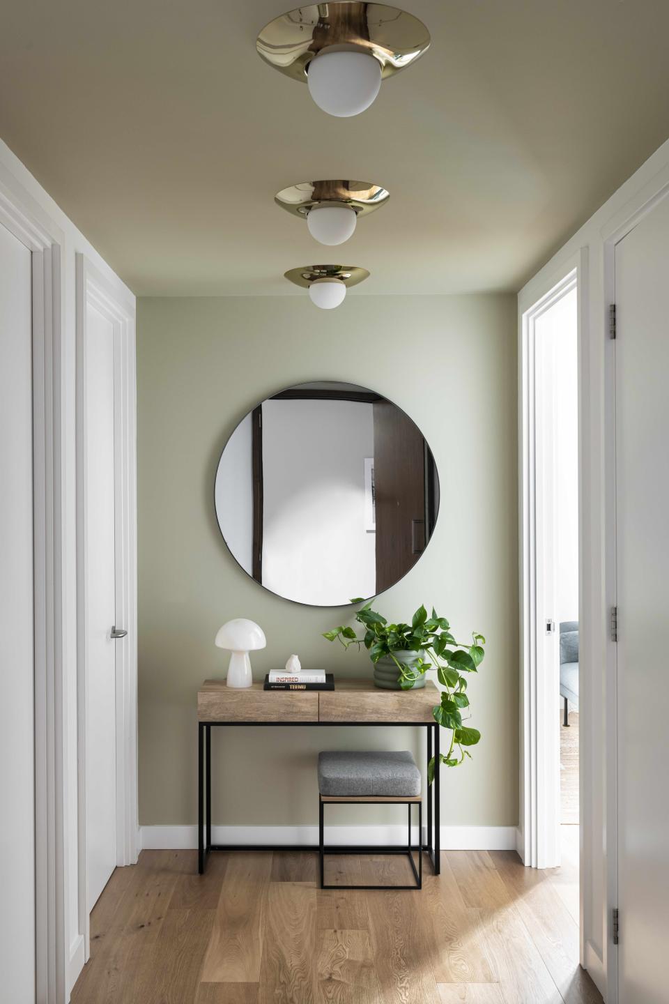 A sage green entryway