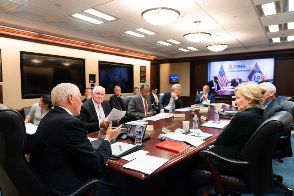 Vice President Mike Pence meets with members of the White House Coronavirus Task Force Tuesday, Sept. 29, 2020, in the White House Situation Room.