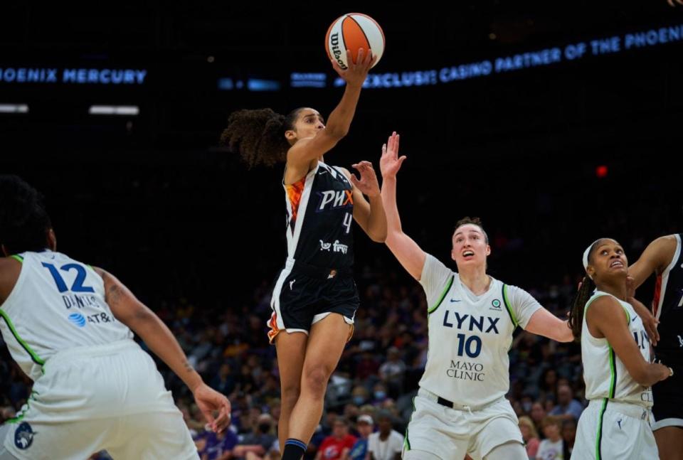 Skylar Diggins-Smith (4) of the Phoenix Mercury drives to the basket against the Minnesota Lynx during Tuesday's game at Footprint Center, June 21, 2022.