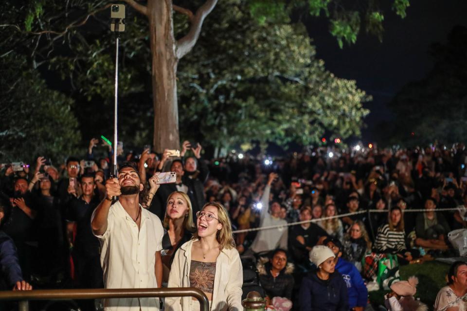 Crowds gather at Mrs Macquarie's Chair to watch the fireworks during New Year's Eve celebrations (Getty Images)