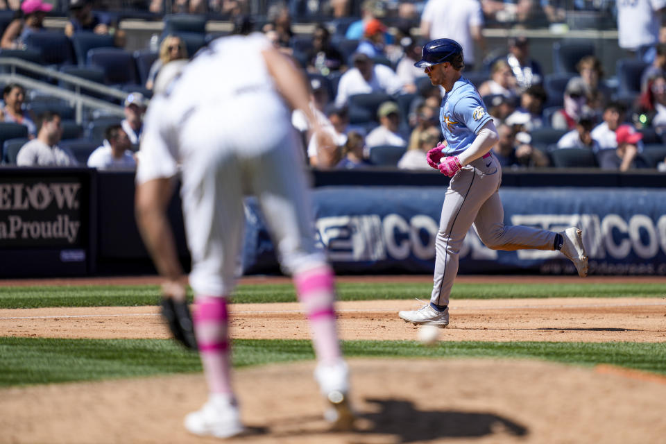 Tampa Bay Rays' Taylor Walls runs the bases after hitting a grand slam off New York Yankees relief pitcher Albert Abreu (84) in the fifth inning of a baseball game, Sunday, May 14, 2023, in New York. (AP Photo/John Minchillo)