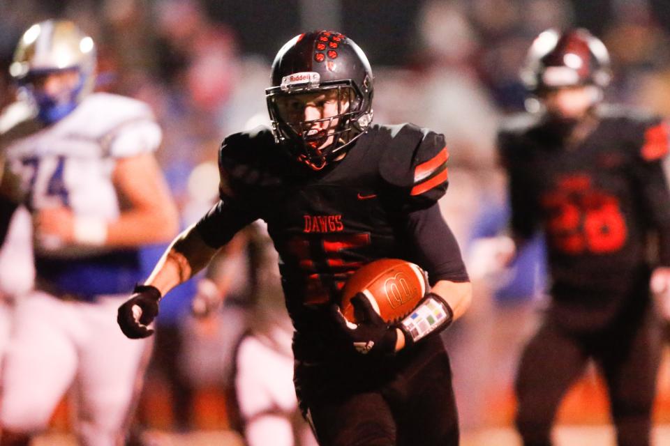 Trenton Barker (15) returns for the 2-time defending 3A state champion Rossville Bulldawgs this fall.