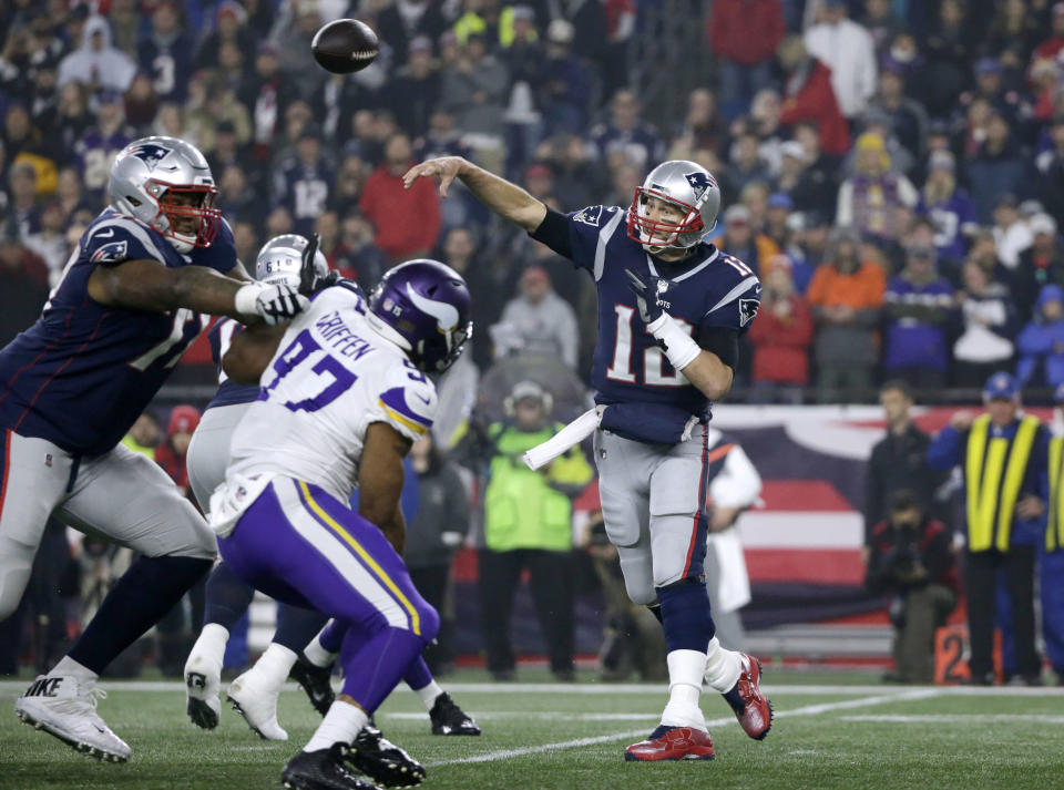 New England Patriots quarterback Tom Brady (12) passes against the Minnesota Vikings during the first half of an NFL football game, Sunday, Dec. 2, 2018, in Foxborough, Mass. (AP Photo/Elise Amendola)
