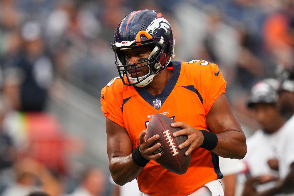 Aug 13, 2022; Denver, Colorado, USA; Denver Broncos quarterback Russell Wilson (3) warms up before the preseason game against the <a class="link " href="https://sports.yahoo.com/nfl/teams/dallas/" data-i13n="sec:content-canvas;subsec:anchor_text;elm:context_link" data-ylk="slk:Dallas Cowboys;sec:content-canvas;subsec:anchor_text;elm:context_link;itc:0">Dallas Cowboys</a> at Empower Field at Mile High. Mandatory Credit: Ron Chenoy-USA TODAY Sports
