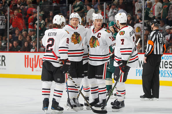 ST. PAUL, MN - FEBRUARY 21: (L-R) Duncan Keith #2, Richard Panik #14, Jonathan Toews #19, and Brent Seabrook #7 of the Chicago Blackhawks celebrate after scoring a goal against the Minnesota Wild during the game on February 21, 2017 at the Xcel Energy Center in St. Paul, Minnesota. (Photo by Bruce Kluckhohn/NHLI via Getty Images)