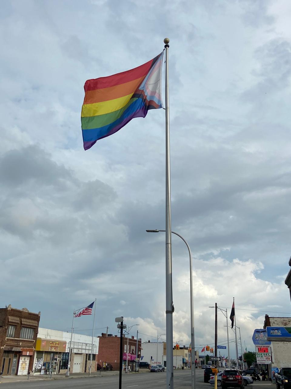 LGBTQ Pride flag seen on Joseph Campau Avenue near Botsford Street, on August 4, 2022. The flag was recently raised, stirring controversy in the city. The avenue has other flags of various nations.