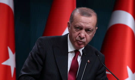 FILE PHOTO: Turkish President Tayyip Erdogan attends a news conference in Ankara, Turkey, August 14, 2018. REUTERS/Umit Bektas/File Photo