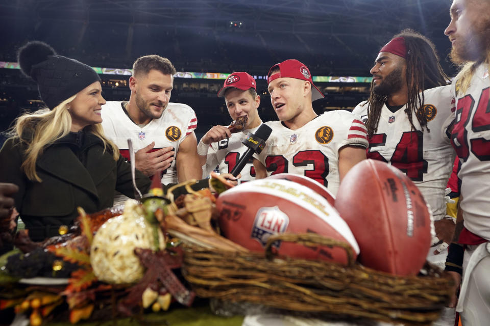 San Francisco 49ers running back Christian McCaffrey (23) is interviewed after an NFL football game against the Seattle Seahawks, Thursday, Nov. 23, 2023, in Seattle. (AP Photo/Lindsey Wasson)