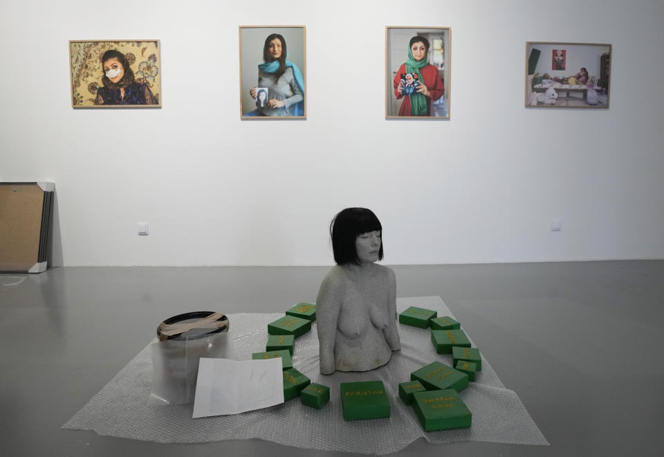 Some exhibits are laid out in rooms at the Ujazdowski Castle Center for Contemporary Art in Warsaw, Poland, Wednesday Aug. 25, 2021. The exhibition which opens Friday at the Polish state museum features the works of provocative artists in what organizers describe as a celebration of free speech, and a challenge to political correctness and "cancel culture" on the political left. Some critics, however, accuse the organizers of the show titled "Political Art" of giving a platform to anti-Semitic, racist and Islamophobic messages. (AP Photo/Czarek Sokolowski)