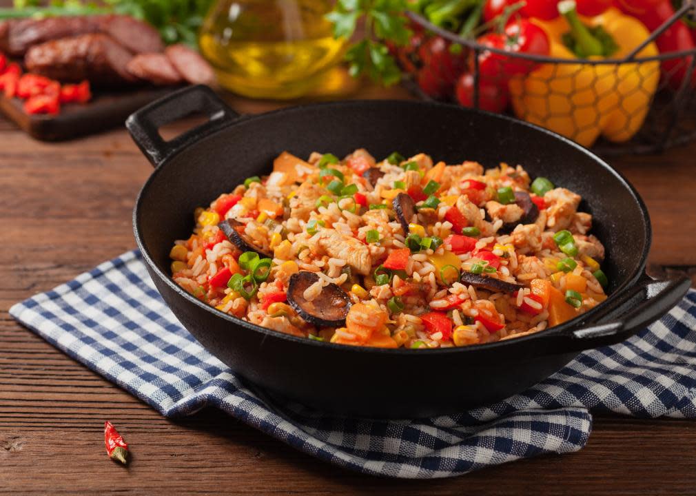 Traditional jambalaya in a cast iron wok.