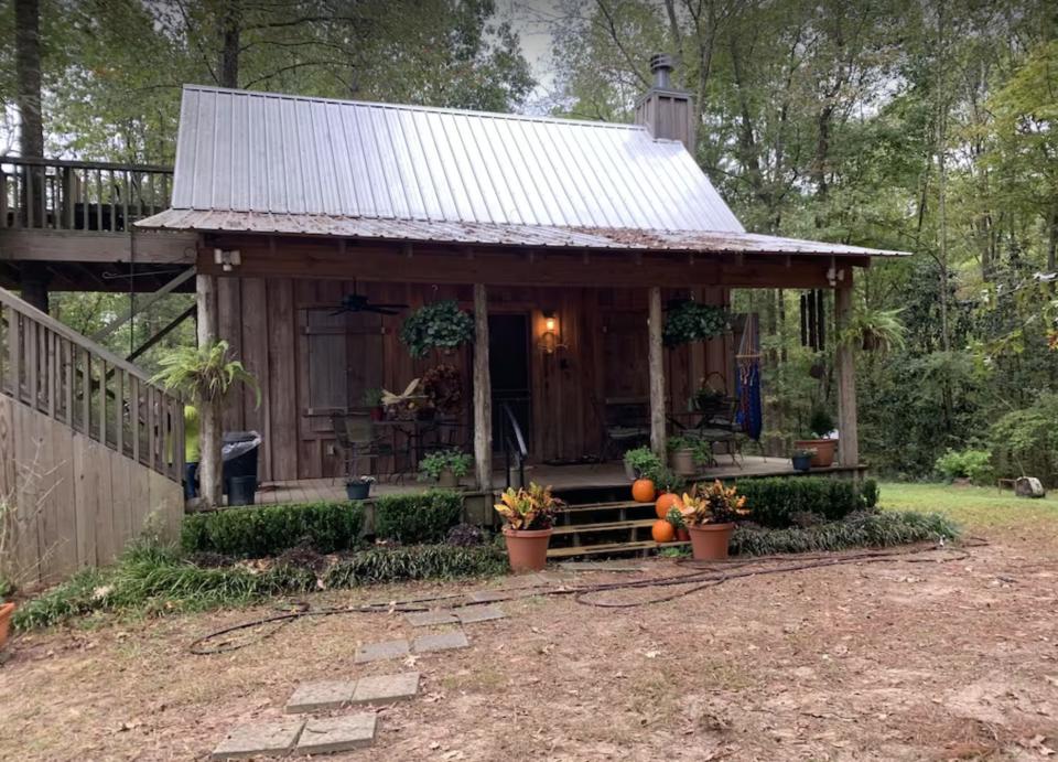 With a large deck, 48 acres and plenty of creeks, this cabin in Amite County is a perfect getaway.