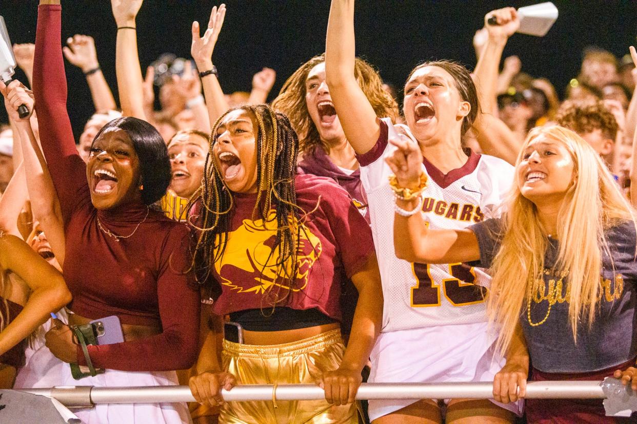 Bloomington North fans show their spirit during the Bloomington South versus Bloomington North football game at Bloomington High School South on Friday, Sept. 10, 2021.