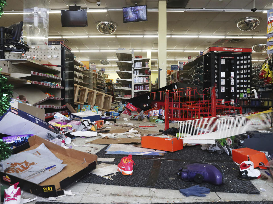 Various retail items litter the ground of a Family Dollar store after it was reportedly looted on Jefferson Avenue in Buffalo. N.Y., on Wednesday, Dec. 28, 2022. Clean-up remains underway after a blizzard hit four Western New York counties. (Joseph Cooke/The Buffalo News via AP)